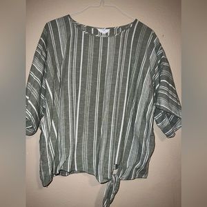 Women’s woven top, olive green with white.